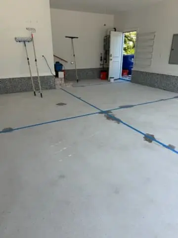 Garage floor coating project in progress